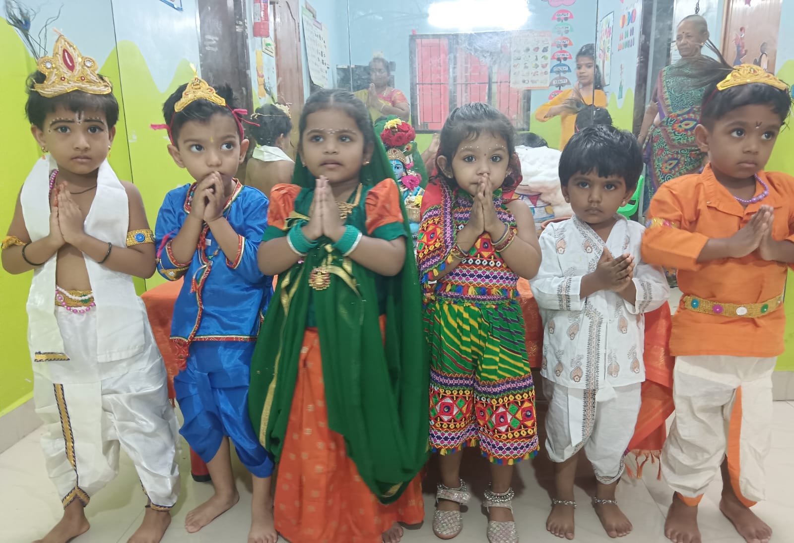 Children in traditional dress at Uyirmei Academy